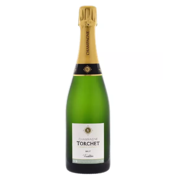 Bouteille de Champagne LAËTITIA TORCHET Brut Tradition en service.