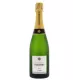 Bouteille de Champagne LAËTITIA TORCHET Brut Tradition en service.