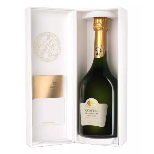 Bouteille de Champagne Taittinger Comtes de Champagne 2013, vue de face, étiquette blanche et capsule dorée