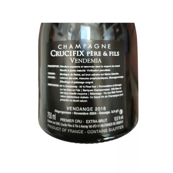 Contre-étiquette Bouteille de Champagne Crucifix Vendemia Extra-Brut Premier Cru, 80 % Chardonnay, 60 mois d’élevage.
