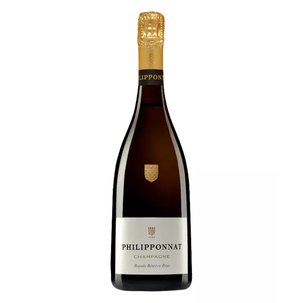 Bouteille de champagne Royale Réserve Philipponnat, or soutenu, mousse fine, une œuvre d'art liquide.