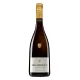 Bouteille de champagne Royale Réserve Philipponnat, or soutenu, mousse fine, une œuvre d'art liquide.